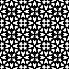 White background with black pattern. Seamless texture for fashion, textile design,  on wall paper, wrapping paper, fabrics and home decor. Simple repeat pattern.