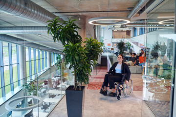 In a modern office, a young businesswoman in a wheelchair is surrounded by her supportive colleagues, embodying the spirit of inclusivity and diversity in the workplace