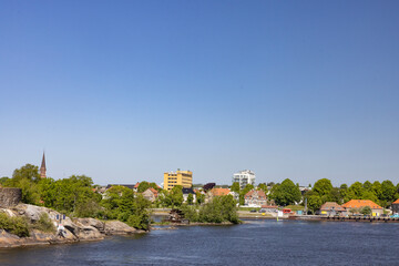 Obraz premium Happy walking in Fredrikstad city on a great warm summer day, with many old buildings, Norway 