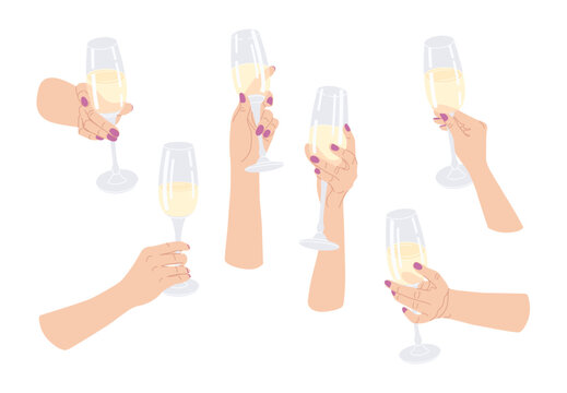 Female Hands Holding Wine Glasses