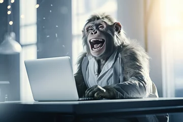 Rolgordijnen A monkey behind a laptop. © BetterPhoto