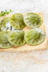 green ravioli fresh green dough  spinach, basil vegetable food meal food snack on the table copy space