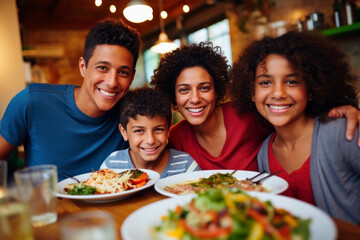 A joyful family shares a healthy meal, filled with smiles and laughter, whether dining at home or enjoying a restaurant outing