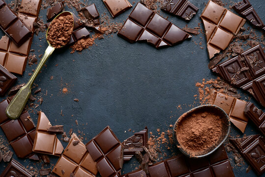 Slices of dark and milk chocolate . Top view with copy space.