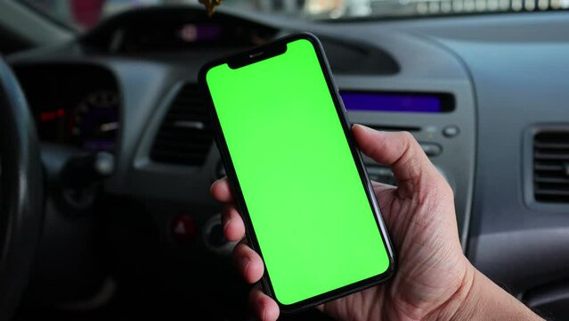 driving a car, hand using mobile phone green screen on car, smartphone green screen 