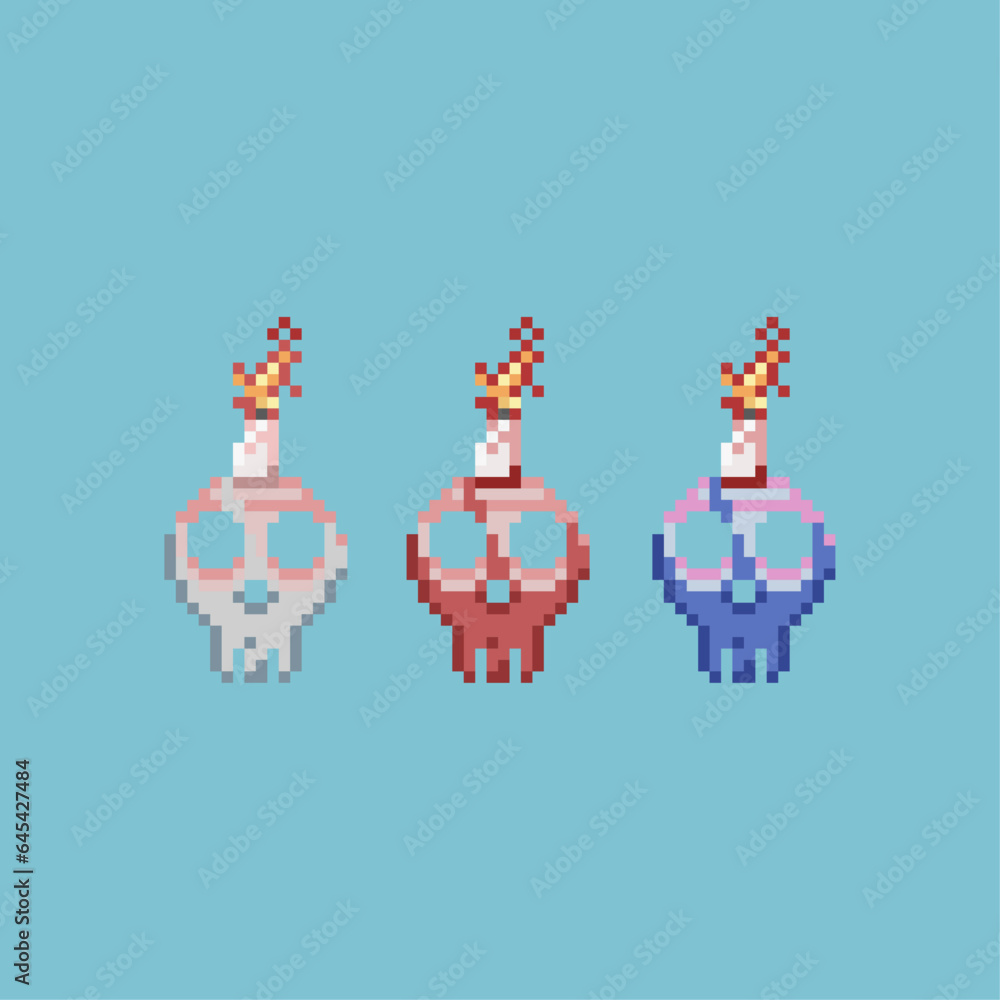 Poster pixel art sets of skull bones with candle with variation color items asset. bones fire on pixelated 
