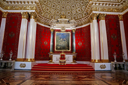 St. Petersburg, Russia - June 10, 2022 - Interior of Hermitage (Winter Palace) with royal throne. Former royal residence is now a Museum with luxury decor,  works of art, sculpture and architecture.