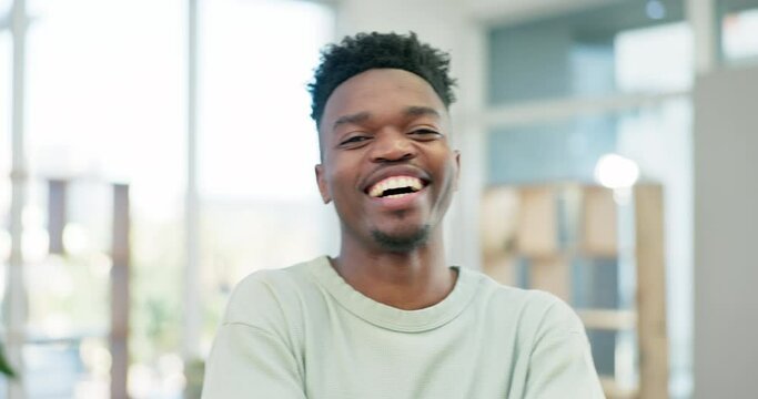 Face, smile and laughing with a designer black man in his office for the start of a creative career. Portrait, funny and a happy young employee in a workplace for a design or marketing internship