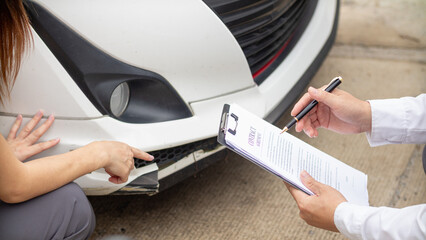 Insurance agents meet with customers when accidents occur to inspect damage and document insurance...