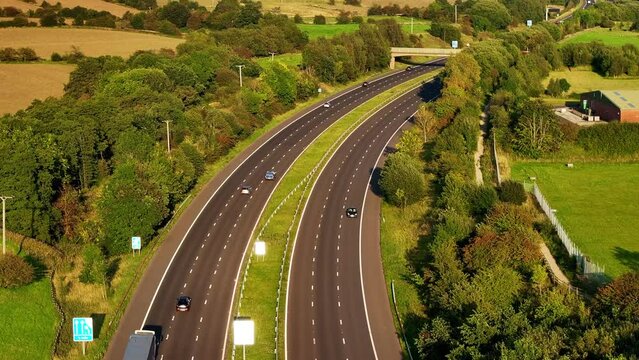 Aerial video of M67 motorway passing through Hyde. 