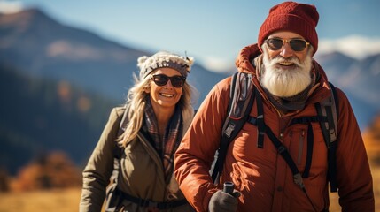 Fototapeta premium senior couple hiking outdoors in autumn