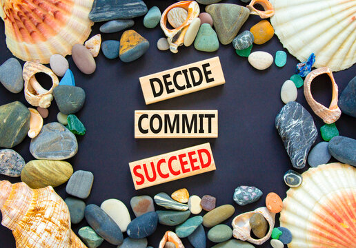 Decide commit succeed symbol. Concept word Decide Commit Succeed on beautiful wooden block. Sea shell stone. Beautiful black table black background. Business decide commit succeed concept. Copy space.