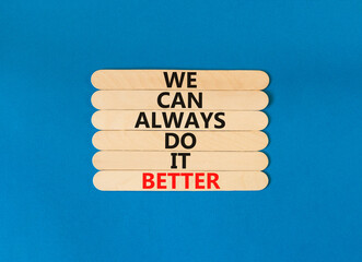 We make it better symbol. Concept words We can always do it better on wooden stick. Beautiful blue table blue background. Business we make it better concept. Copy space.