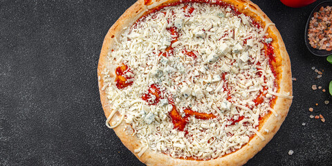 raw pizza four cheeses assorted akmezan cheese, gorgonzola, mozzarella, emmental fast food appetizer meal food snack on the table copy space food background rustic top view