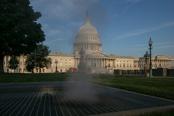 Capitol hill with smoke in front of it