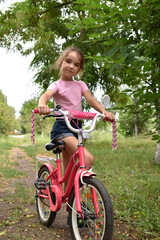 little girl riding a bike