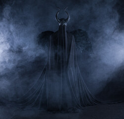 demon angel with black wings on a black background