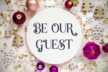 Fototapeta na wymiar Purple And Festive Christmas Background With Text Be Our Guest