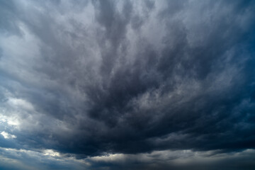 storm sky, dark dramatic clouds during thunderstorm, rain and wind, extreme weather, abstract...