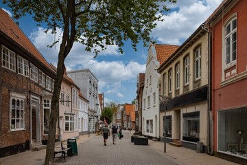 Fototapeta na wymiar Walking in Tonder´s (Tønder) streets on a beautiful summer day, Sønderjylland, Denmark