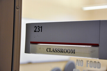 Sign on door for 231 classroom.