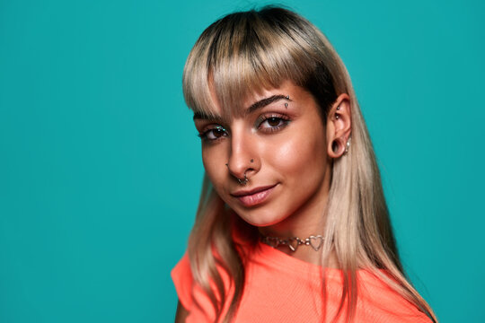 Informal female model with piercing on face
