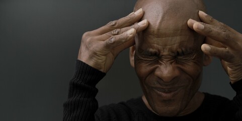 man praying to god on grey black background with people stock photos stock photo