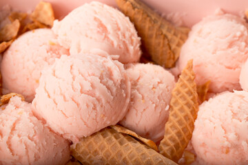 Strawberry pink ice cream with waffles, summer 