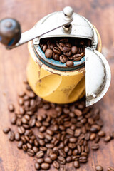 Vintage coffee grinder and coffee beans