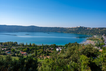 Naklejka premium Castel Gandolfo, view on green Alban hills overlooking volcanic crater lake Albano, Castelli Romani, Italy in summer