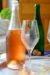 Tasting of grand cru sparkling white wine with bubbles champagne in old champagne house in grand cru wine producer small village Ambonnay, Champagne, France