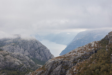 landscape with river and mountains on hike in Norway on fjord