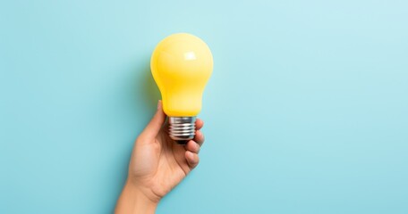 Hand holding light bulb on green background, concept of ideas and creativity. Generative AI