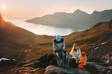 Fotobehang Family hiking in Norway mountains travel adventure vacations group hikers mother and father with child backpacking outdoor healthy lifestyle eco tourism © EVERST