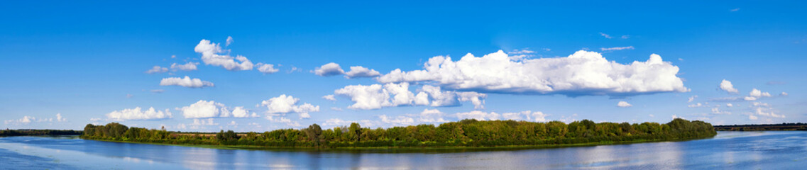 Fototapeta na wymiar Panoramic landscape of the river on a clear sunny day