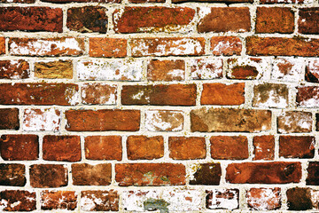 Background of an old red brick wall. Vintage film camera effect added
