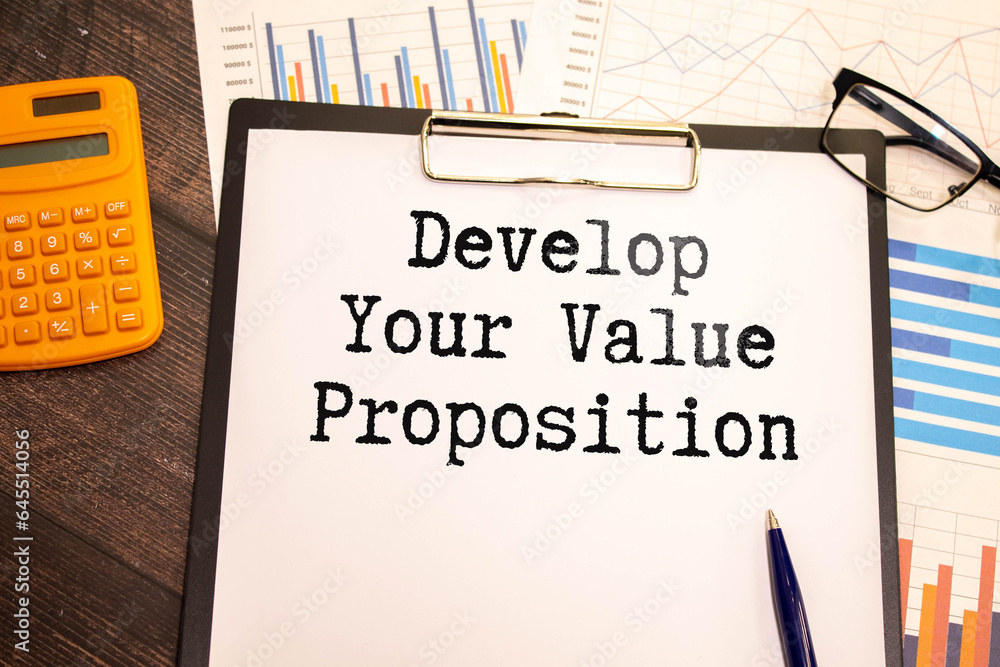 Poster notebook with text Develop Your Value Proposition