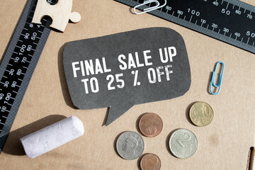 FINAL SALE UP TO 25 percents text on a black tag on a white paper background