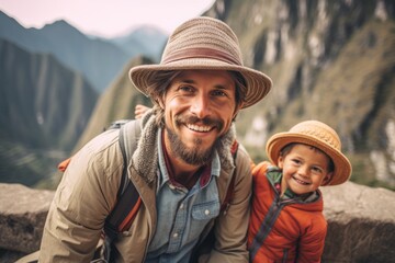 Lifestyle portrait photography of a grinning man in his 30s that is with the family at the Machu Picchu in Cusco Peru