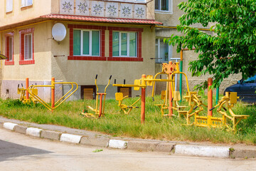 Children's playground in the courtyard of an apartment building. Background with selective focus and copy space