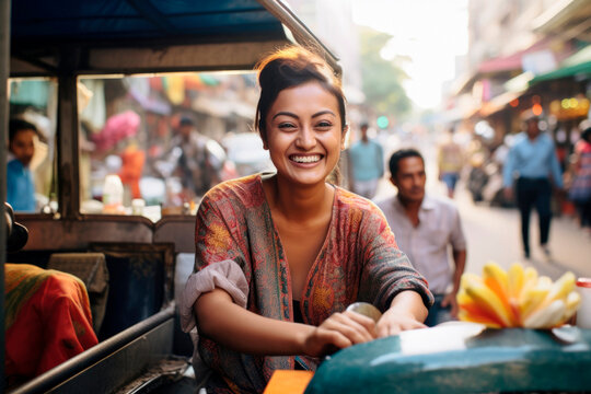 Friendly Tuk-Tuk Driver: A Southeast Asian Woman Sporting A Wonderful Smile In Her Tuk-Tuk.

