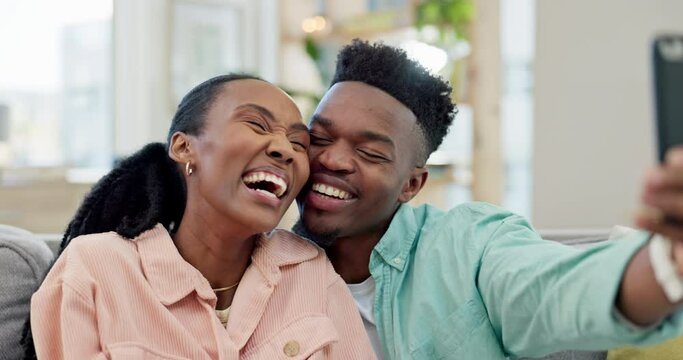 Happy, couple, and kiss for selfie in home on video call, profile picture or broadcast social media post. Young man, woman and black people smile for photography of memory, love and laughing together