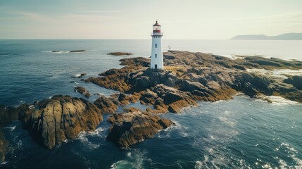 View from the top of a lighthouse on a small rocky island - obrazy, fototapety, plakaty