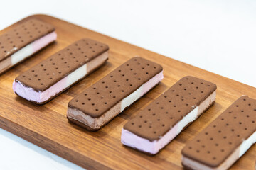 Neapolitan ice cream sandwich bars on cutting board