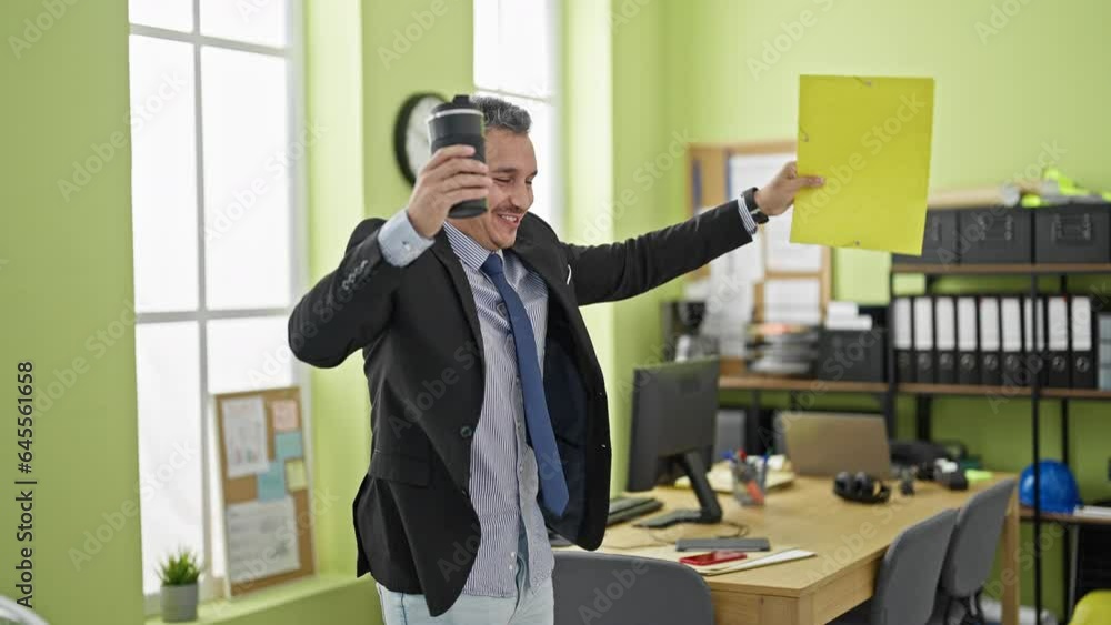 Canvas Prints Young hispanic man business worker dancing at office