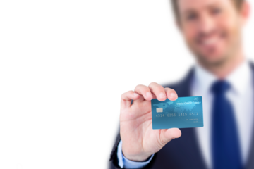 Digital png photo of smiling caucasian businessman with credit card on transparent background