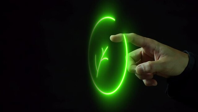 Human hand shows glowing virtual green leaf icon. Net zero greenhouse gas emissions target. Climate neutral long term strategy. Ecological, renewable energy and save environment concept.