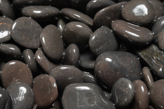 Full frame shot of beach pebbles rock texture and background. Beach pebbles are sediments.