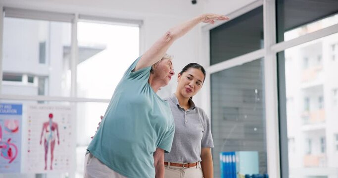 Physiotherapy, elderly woman and stretching arms for recovery, exercise and healing from injury. Physical therapy, chiropractor and senior person workout in rehabilitation, wellness and body health