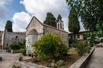 Fototapeta na wymiar An old Greek monastery with a sunny summer day on the island of Crete